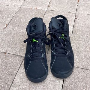 gently used black and green Jordan’s 1c